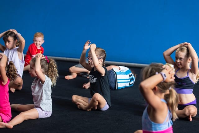 Holiday Workshops 15 kids exercising at ModBod Gym