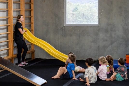 Coach with kids on training at ModBod Gymnastics