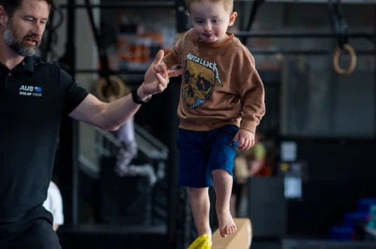 Kid on gymnastic training at at ModBod Gymnastics